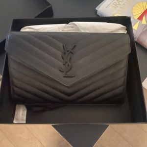 Brand new, never used YSL bags (tags still on)